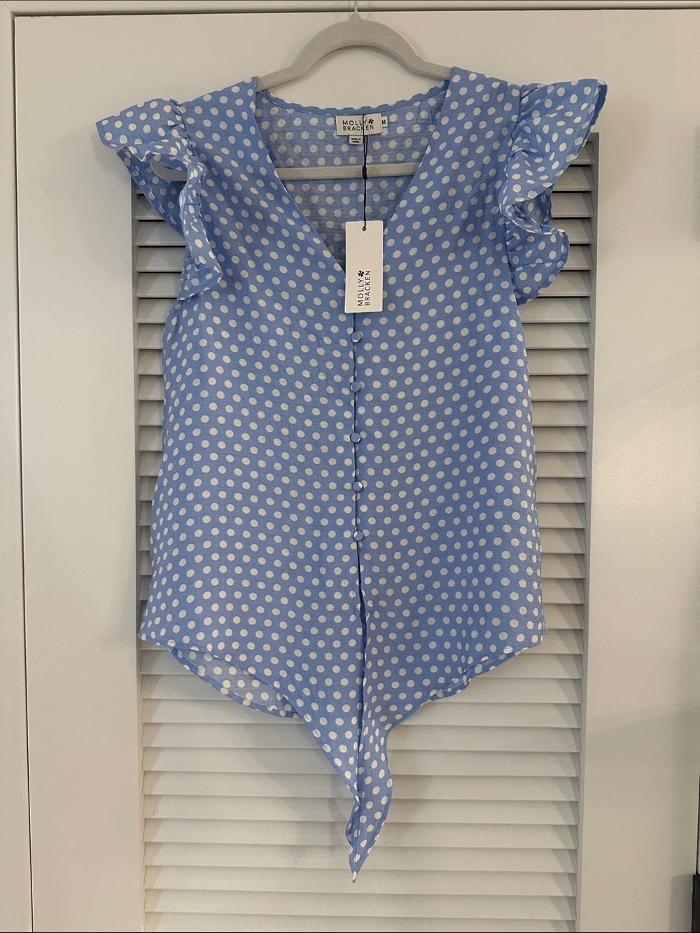NWT Molly Bracken Blue Polka Dot Ruffle Sleeve Tie Hem Blouse M